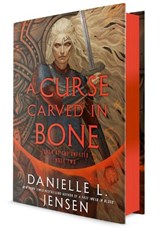 A Curse Carved in Bone - Danielle L. Jensen - 9780593599860