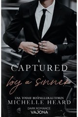 Captured by a Sinner - Michelle Heard - 9783987185335