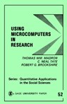 Using Microcomputers in Research - Thomas W. Madron ; C . Neal Tate ; Robert G. Brookshire - 9780803924574