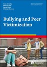 Bullying and Peer Victimization - Amie E. Grills ; Chelsey Bowman ; Melissa Holt ; Gerald Reid - 9780889374089