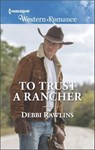 To Trust a Rancher - Debbi Rawlins - 9781488092749