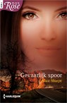 Gevaarlijk spoor - Alice Sharpe - 9789402525564
