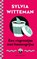 Een visgraatjas met haaiengrijns, Sylvia Witteman - Paperback - 9789038811079