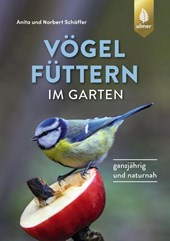 Vögel füttern im Garten