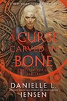 A Curse Carved in Bone - Danielle L. Jensen - 9780593599884