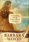 Woman of a Thousand Secrets - Barbara Wood - 9781429956345