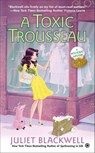 A Toxic Trousseau - Juliet Blackwell - 9781101635322