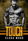 A Biker’s Touch: A Bad Boy Motorcycle Club Romance (Merrick Boys MC) - CLARA WOOD - 9781386014584