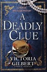 A Deadly Clue - Victoria Gilbert - 9798892422154